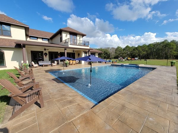 Brown Stamped Concrete, Rectangular Pool, Beach Entry
Concrete Pool Decks
Dreamcrete Custom Creations
Orlando, FL